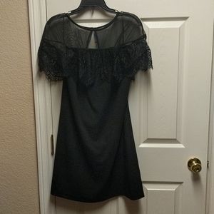 Black dress with lace and button detail
